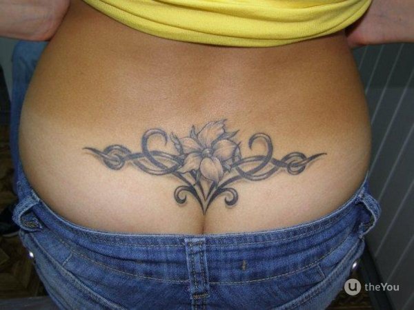 Grande-lower-back-blackgrey-tattoo-water