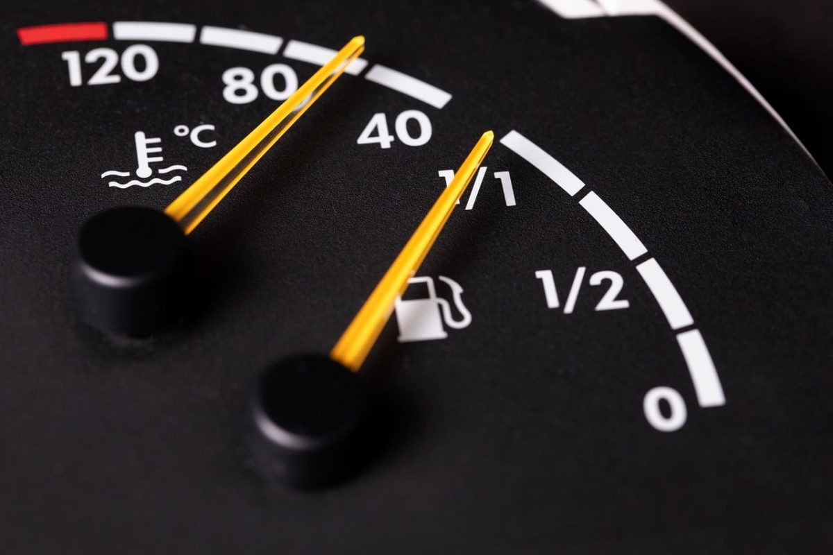 fuel gauge, thermometer, temperature symbol, gauge, zero, degree, analog display, dashboard panel, black color, yellow needle, motor vehicle, dashboard, vehicle control, fuel level indicator, mechanical measurement, forty, fuel tank, temperature scale, five
