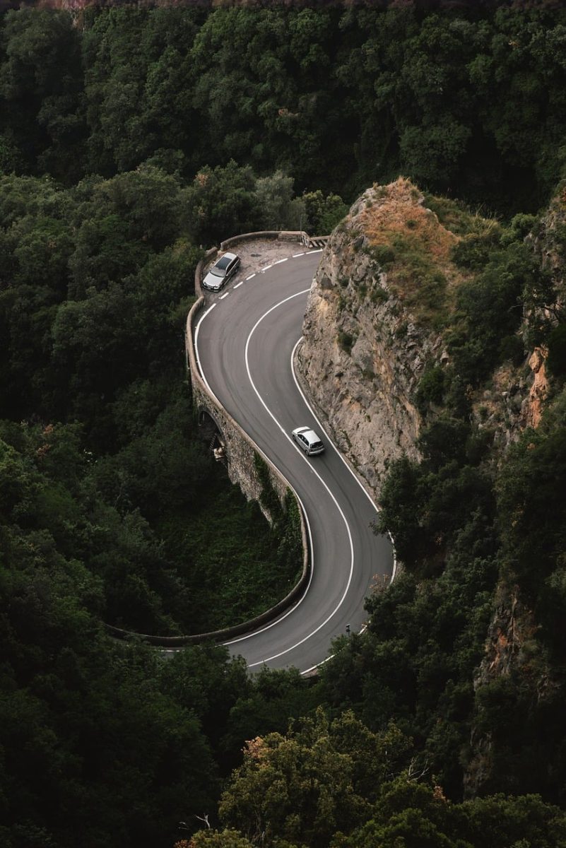 winding road, wooded area, car, rocky area, forest, nature, car wallpapers, road, transportation, tourist attraction, view, road traffic, light green, panorama, highway, coastal landscape, guidance, elevation, ecology, green trees, cave, fresh air, natural reserve