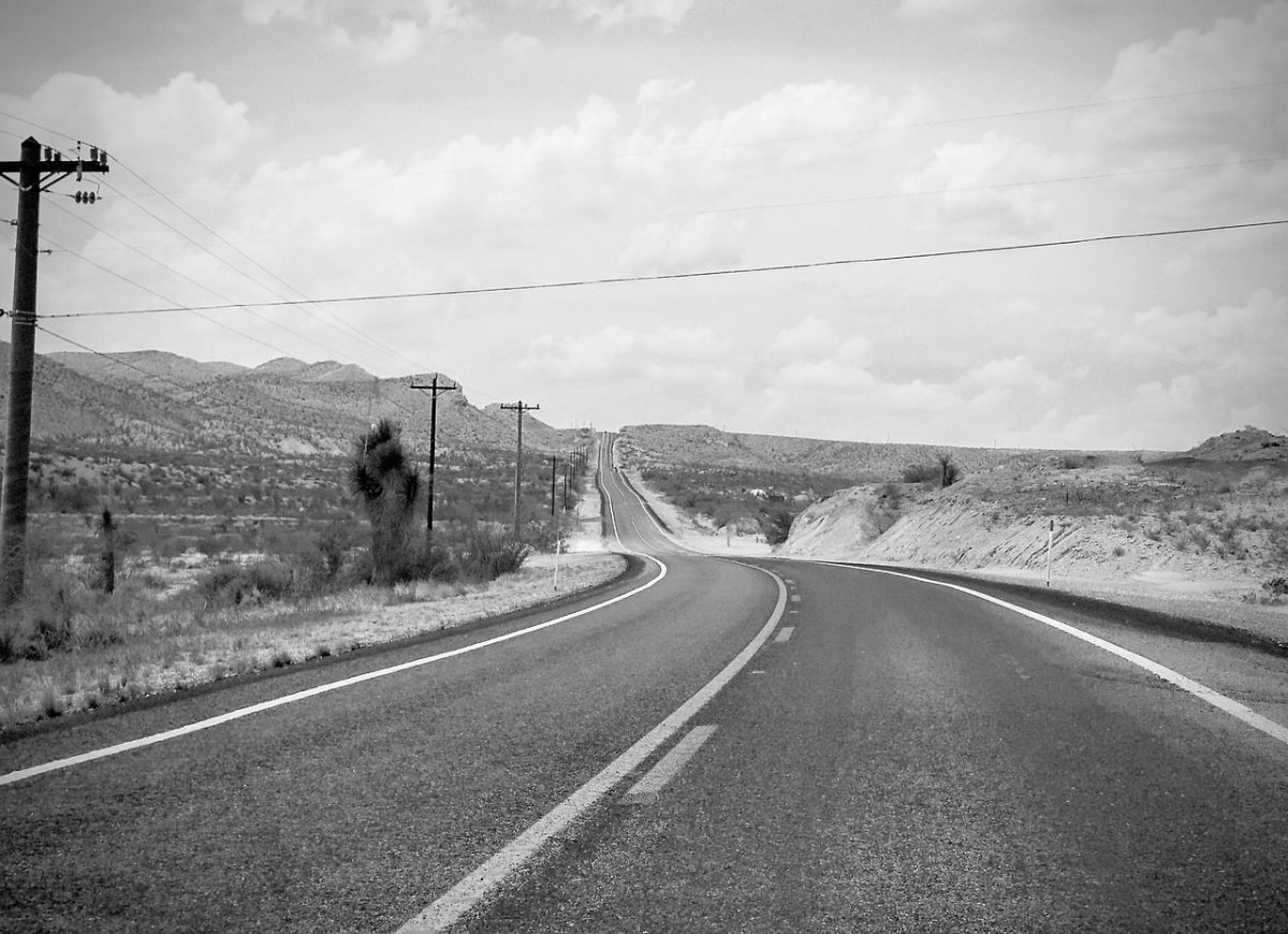 road, desert, highway, black and white, nature, road marking, telephone pole, sky, mountains, landscape, asphalt, desert landscape, travel, uninhabited, weekend getaway, deserted, expedition, adventure, solitude, panoramic view