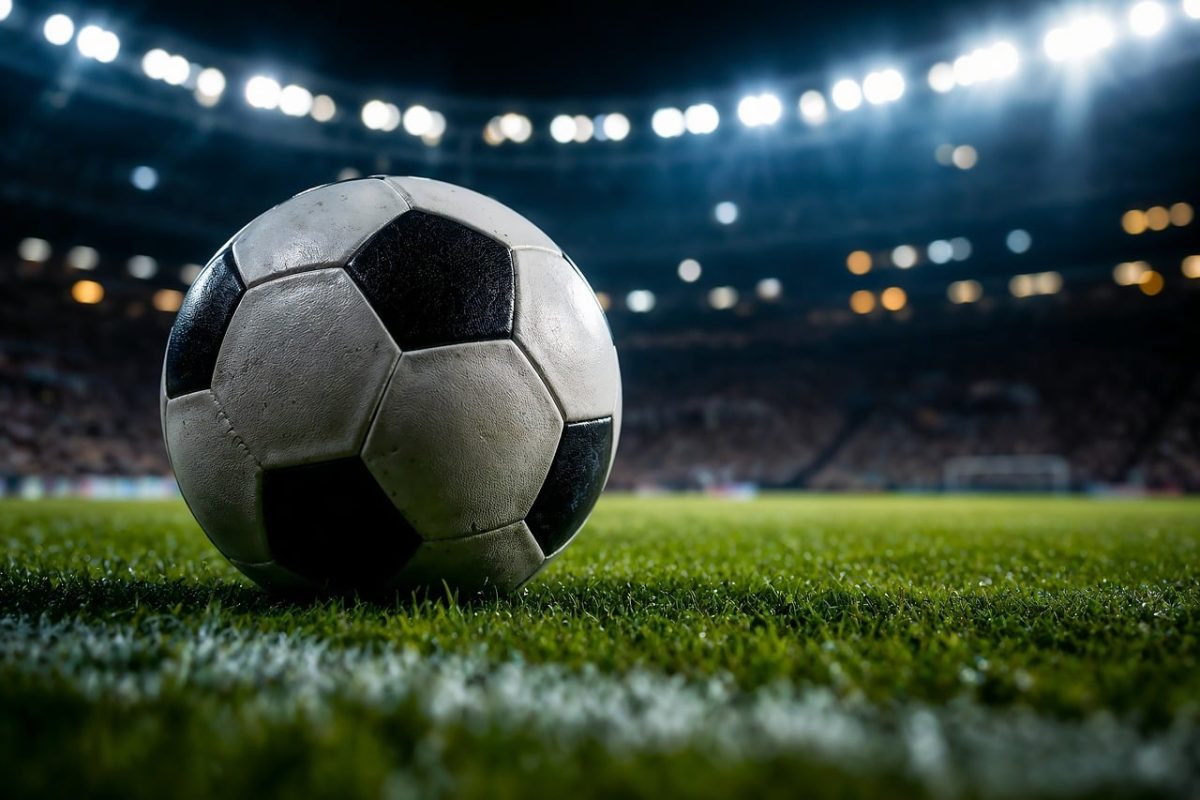 football, ball, grass, stadium, lights, nature, bokeh, macro, texture, leather, sport, tension, focus, dramatic, kickoff, penalty, field, night, cinematic, shallow depth, football game