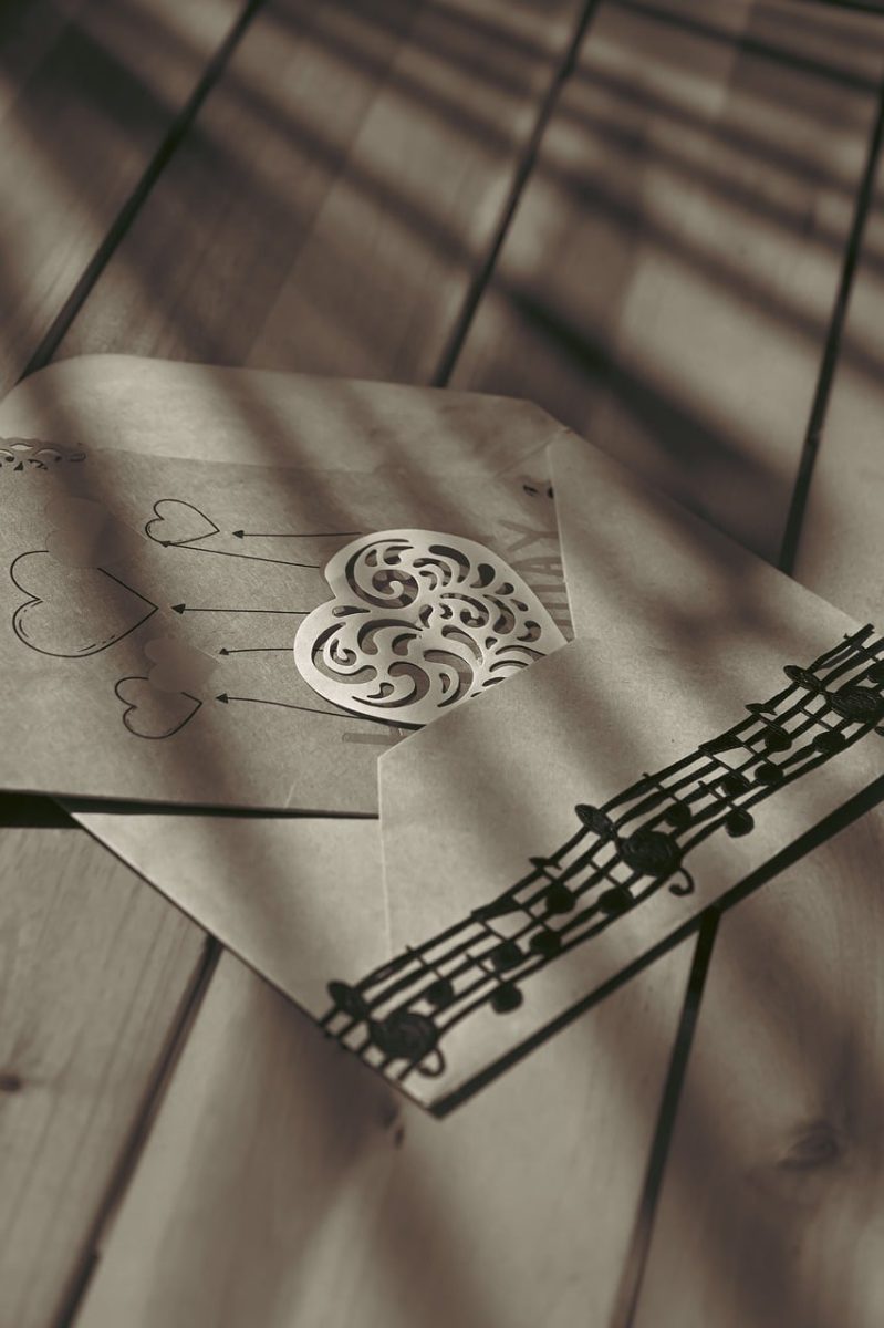 paper art, papercut, heart, love, envelope, music, musical notes, romance, emotion, memories, symbolism, still life, dramatic lighting, handmade, craft, creative, artistic, minimalism, card, valentine