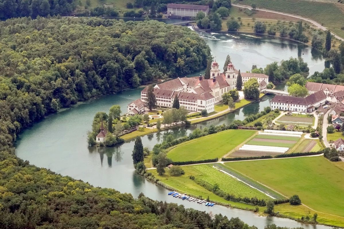 monastery, island, rhine, aerial view, loop, river, landscape, switzerland, forest, farm, europe, water, greenery, european landmark, cloudy day, peaceful landscape, architecture, tourist attraction, historic site
