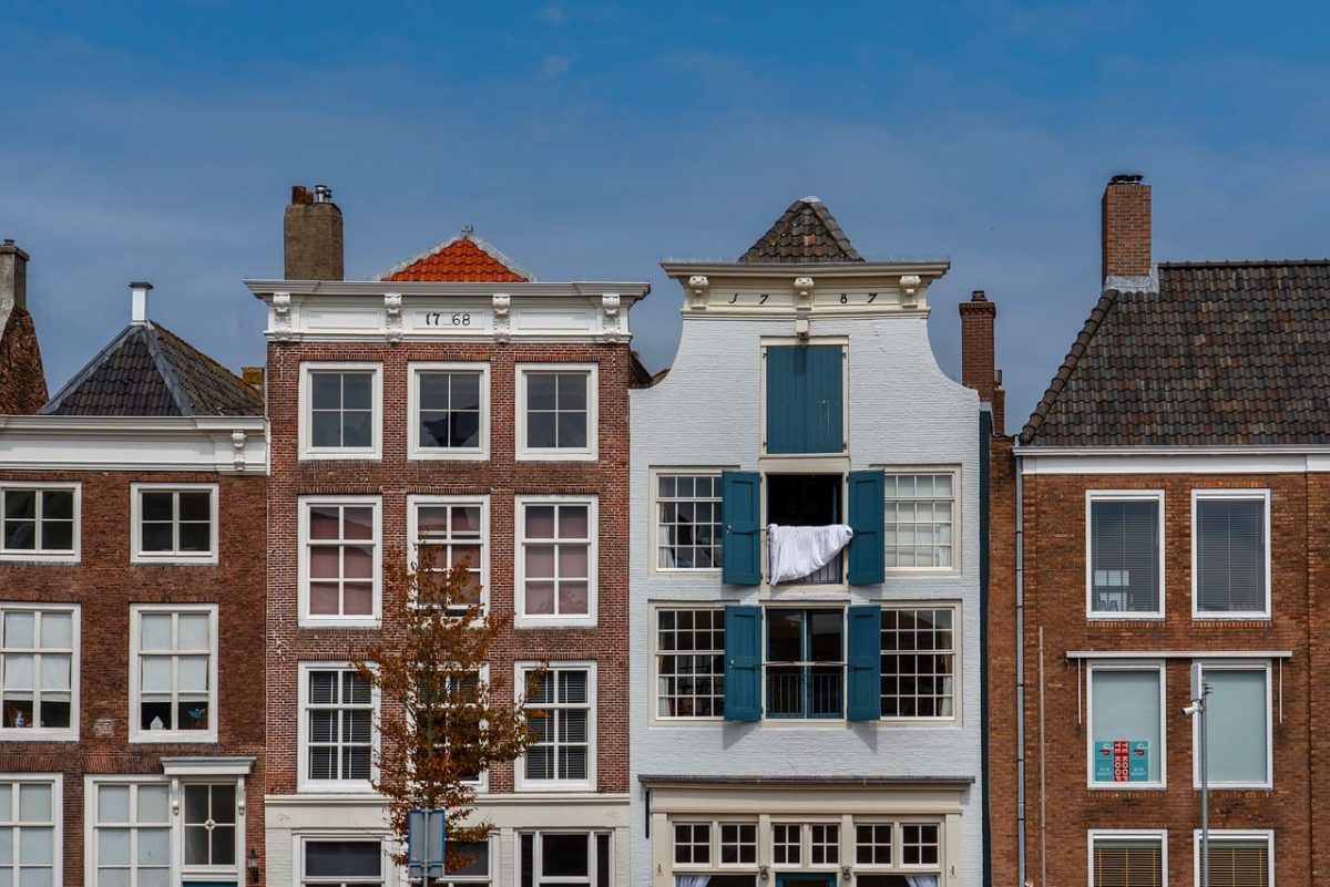 holland, historical architecture, houses, architecture, brick houses, windows, dutch architecture, mansion, exterior, cityscape, trees, blue sky, dutch townhouse, tree, decoration, balcony, open windows, tree in front of house, autumn season, antique houses