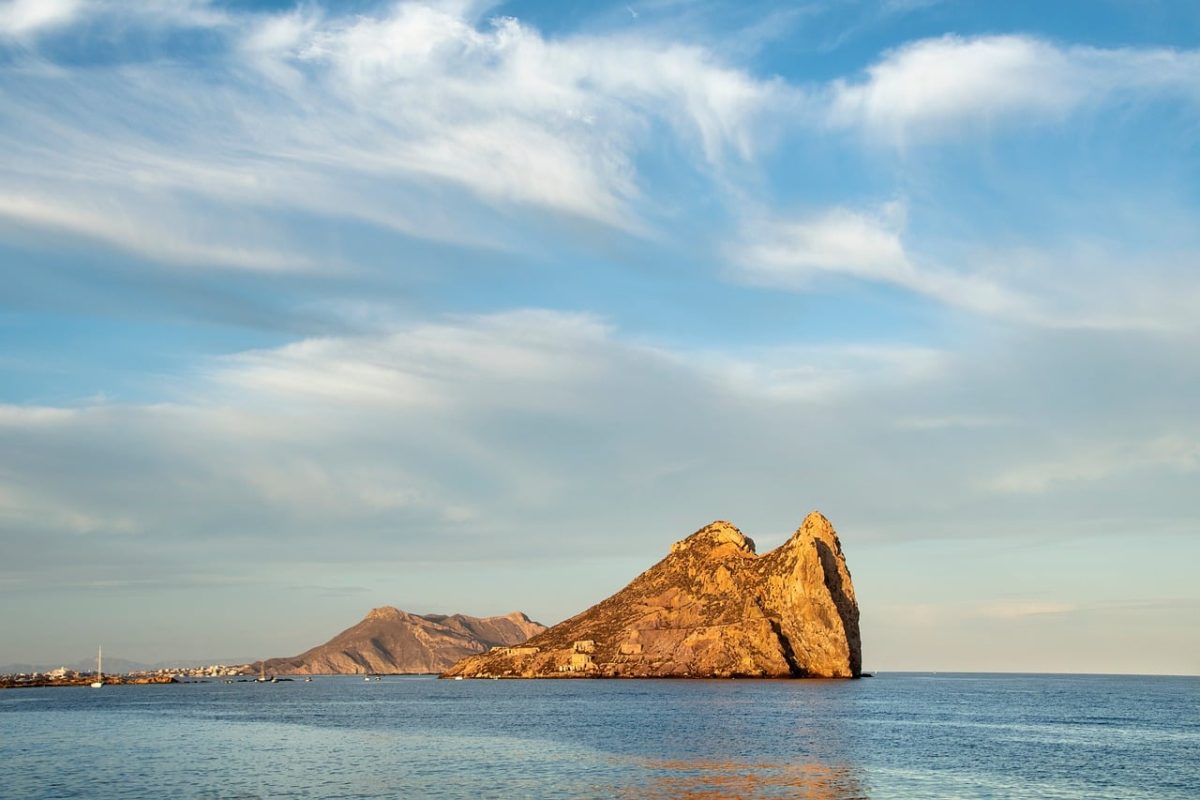 sea, island, cliffs, sky, clouds, shapes, blue, landscape, silhouette, calm, sunset, sediments, water, light, nature, tourism, reflection, lights, summer, horizon