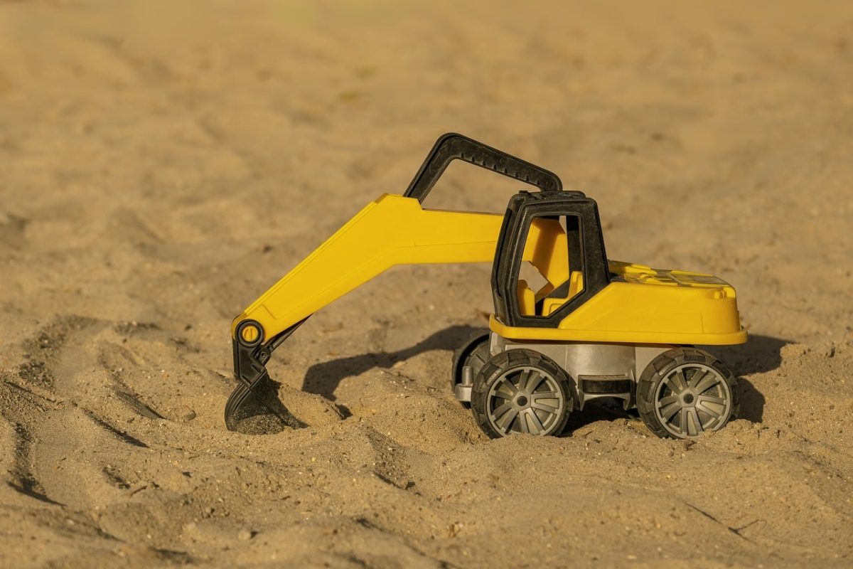toy, digger, sand, yellow, child's play, four-wheeled, outdoor play, children's entertainment, toy vehicle, play area, preschooler, child, sandbox toy, kids world, outdoor activity, classic toy, imagination, summer season, creative play, four-wheeler