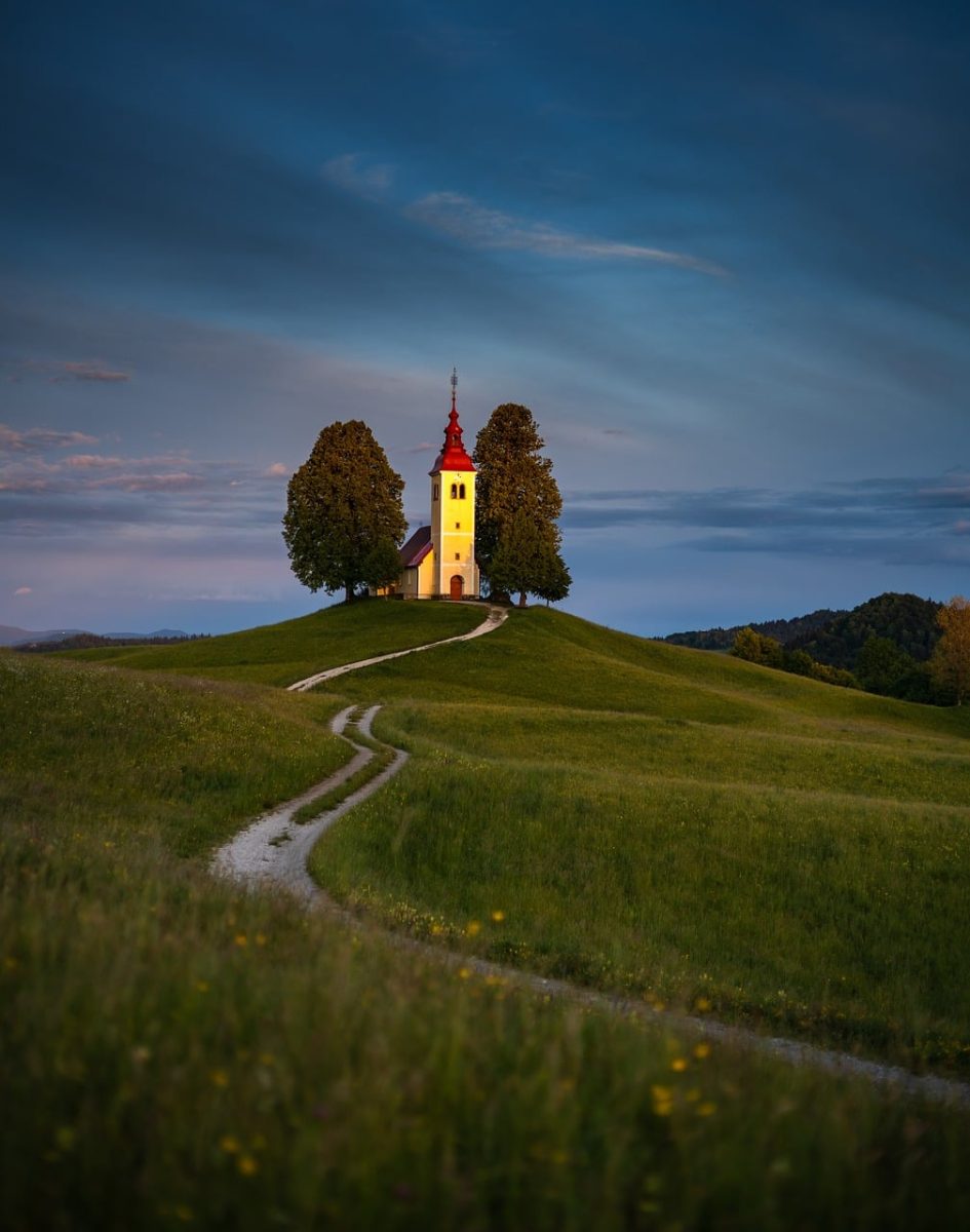 church, slovenia, landscape, sunset, evening, nature, hilly, path, trees, countryside, glowing, hill, scenery, solitary, blue sky, evening light, silhouette, hiking, peaceful, calm