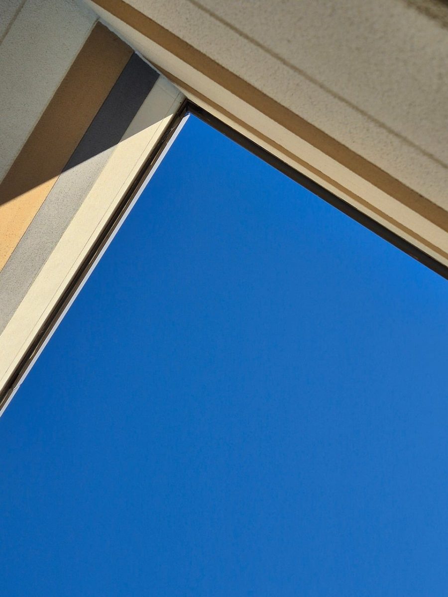 modern architecture, blue sky, geometric shape, perspective angle, minimalism, concrete building, architectural detail, shadow variation, morning light, clear day, outdoor setting, straight lines, linear composition, stylish design, architectural perspective, no detail, building angle, shadowed, sunny day