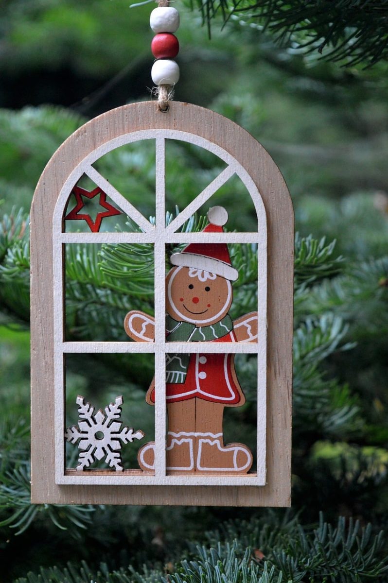 christmas decoration, christmas motif, wooden decoration, gingerbread man, pine branches, snowflake, red decoration, transparent window, winter decoration, green twigs, cartoon design, christmas greeting, traditional decorations, hanging decoration, advent, wood and needles, handmade ornament, christmas season