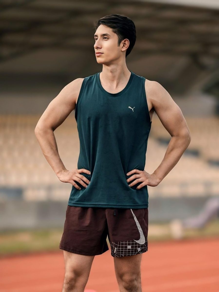 mens, athlete, sport, athletic, model, body, track and field, field, competition, stadium, exercise, outdoors, athletics, pose, photoshoot, smile, posing, fitness, sweat, corridor, influencer, portrait
