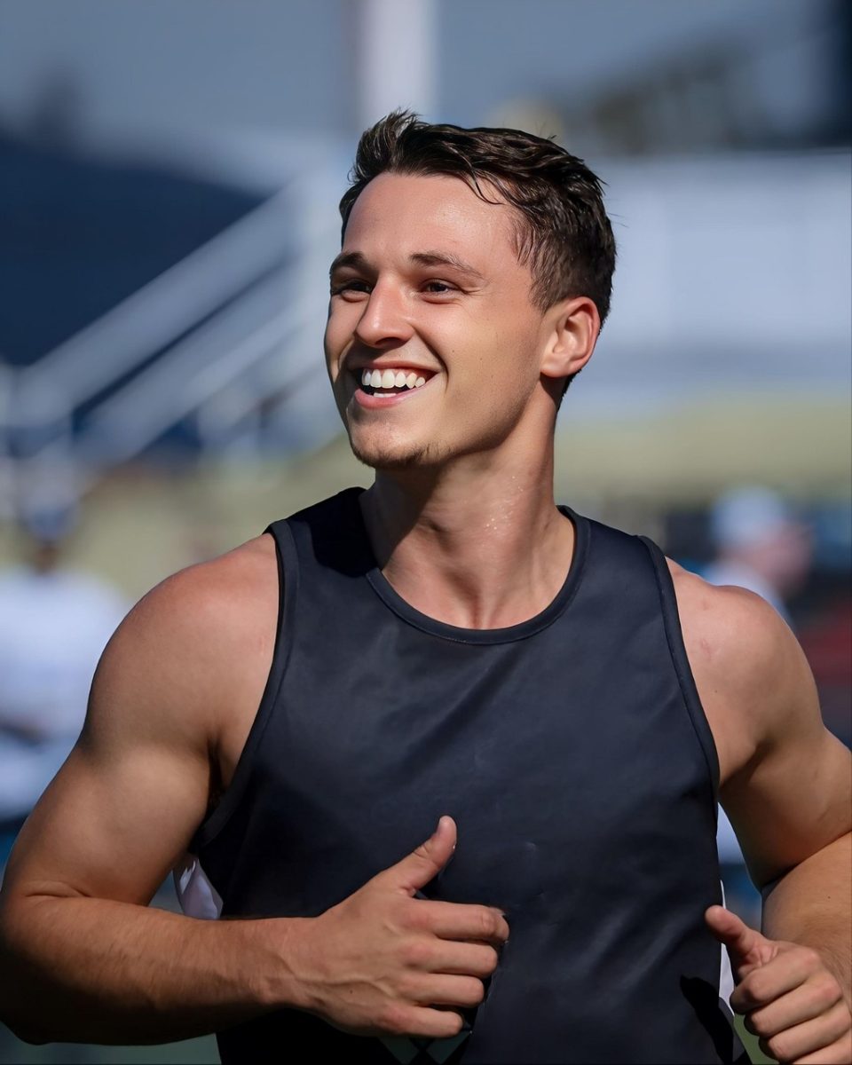 men, athlete, sport, athletic, model, body, track and field, field, competition, stadium, exercise, outdoors, athletics, pose, photoshoot, smile, posing, fitness, sweat, corridor, influencer, headshot