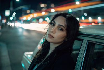 woman, night, car, blurred lights, urban landscape, bokeh effect, model, fashion, night scene, thoughtful, gazing into distance, expression, artistic, car wallpapers, car in background, romantic touch, night portrait, mysterious atmosphere, young woman, photography style