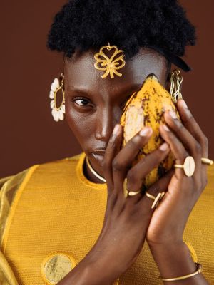 fashion, model, portrait, man, style, hairstyle, posing, pose, accessory, cocoa, fruit, gold color, earring, ring, personal style, trendy, facial expression, artistic, modern, symbolism