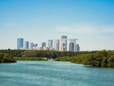 panorama, urban landscape, skyscrapers, sky, river, modern buildings, architecture, water, scenic view, greenery, city, middle east, horizon, daylight, tourism, high-rise, urban area, blue sky, nature, landmark