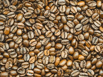 coffee, coffee beans, roasted, texture, brown, coffee aroma, coffee industry, food, coffee blends, organic, alt text close-up of coffee beans, bulk production, energy, close-up, caffeine, warm tone, natural product, coffee trade, harvest