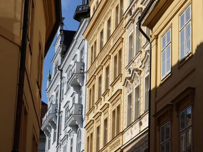 prague, architecture, buildings, city, history, european, streets, light, shadows, detail, blue sky, ochre, sunny, walls, windows, picturesque, old world, balconies, charming