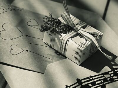 gift, sheet music, dried lavender, ribbon, envelope, romance, musical motif, nostalgia, warm feeling, handmade, shadow, light and shadow, vintage, fine art, monochrome, craft, artistic composition, elegant, minimalism
