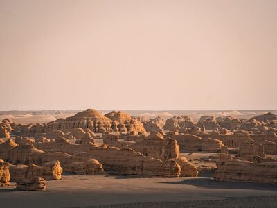 desert, rock formations, nature, sand, natural scenery, desert landscape, dryness, sunset scene, warm colors, vastness, silence, evening light, natural beauty, adventure, hiking, outdoor, tourism, emptiness, calmness, natural monument, four seasons