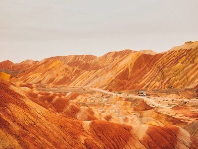 colorful mountains, chinese geological park, danxia landscape, desert scene, mountain landscape, rock formations, natural tourist attraction, red rocks, vivid colors, china, national park, hiking, sandy valley, sunny weather, nature, landscape painting, scenic road, red and yellow, geology, national monument, brownish-yellow cliffs