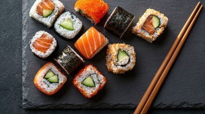 sushi, salmon, rice, gastro, japanese cuisine, chopsticks, fresh seafood, traditional dish, cutting board, culinary presentation, salad, japanese restaurant, healthy food, nutrition, shrimp, cucumber, soy sauce, vegetarian, striped plate, exotic cuisine