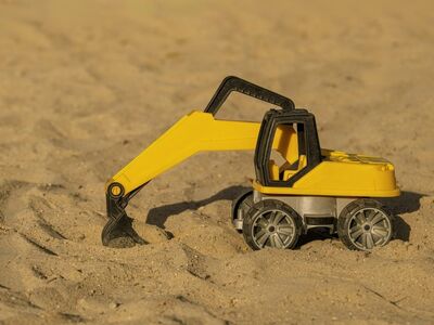 toy, digger, sand, yellow, child's play, four-wheeled, outdoor play, children's entertainment, toy vehicle, play area, preschooler, child, sandbox toy, kids world, outdoor activity, classic toy, imagination, summer season, creative play, four-wheeler