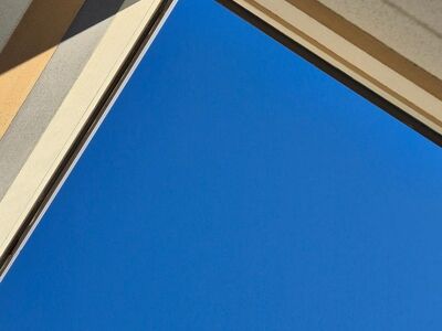 modern architecture, blue sky, geometric shape, perspective angle, minimalism, concrete building, architectural detail, shadow variation, morning light, clear day, outdoor setting, straight lines, linear composition, stylish design, architectural perspective, no detail, building angle, shadowed, sunny day