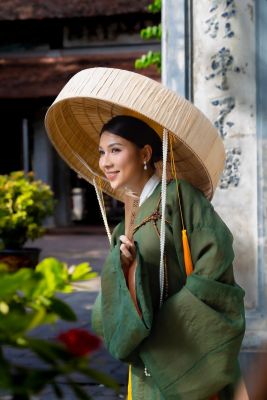 vietnamese woman, traditional hat, bamboo, flower wallpaper, female portrait, cultural clothing, smiling, asian culture, outdoors, silk garment, asian fashion, courtyard, happiness, traditional vietnamese attire, flowers, tourism, beautiful flowers, historical architecture, smiling woman, flower background, asian woman, nature, traditional attire, summer, green color