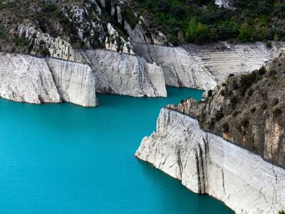 lake, blue water, cliffs, natural landscape, mountains, reservoir, rock formation, nature, tourist destination, water, crystal clear, nature experience, dam, limestone, grass, summer, peaceful, natural monument, fresh