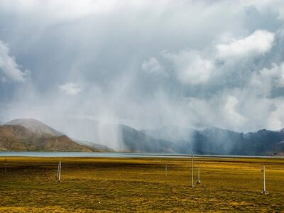 tibet, rain curtain, alpine lake, mountain range, tibetan plateau, storm clouds, dramatic weather, wilderness, grassland, high altitude, power poles, overcast sky, travel, landscape, clouds, nature, rural, remote, roadway, hiking