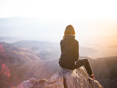 people, woman, travel, adventure, trek, nature, mountain, rock, sunset, cliff, black, hoodie, jacket, alone, thinking, freedom
