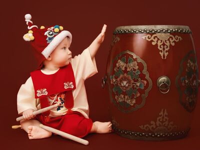 baby, traditional clothing, drum, red, new year, tet festival, asian child, cultural festival, child drumming, scarlet, decoration, drum hat, smiling child, photo studio, stick, drumming, ornate, vietnamese festival, children's festival