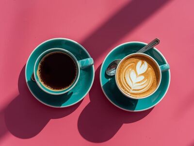 coffee, espresso, cappuccino, cup, saucer, pink background, shadows, milk foam, latte art, two cups, blue ceramic, morning, table setting, pink coffee, coffee cup, stylish photo, coffee with friends, daylight, tranquil moment, classic design