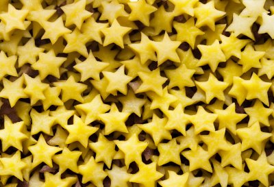 starfruit, carambola, slices, yellow, green, star, shape, exotic, tropical, fruit, seeds, pattern, citrus, tart, fresh, unique, texture, healthy, snack, organic, ai generated