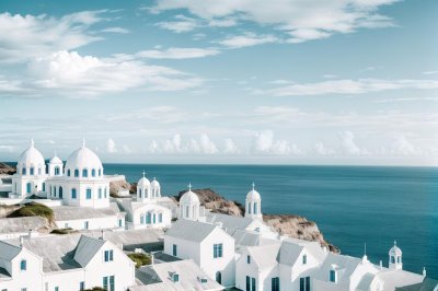 white houses, blue domes, ocean, coastal, travel, architecture, scenic, coastline, village, tourism, island, greece, cyclades, blue sky, aerial view, mediterranean sea, tourist attraction, white stucco, santorini, nature, seaside village