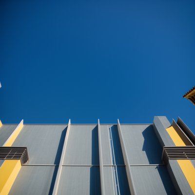 building, architecture, facade, roof, color, blue, yellow, red, village, location, decoration, bright, spot, retraction, notable, urban, windows, vibrant, linear, symmetrical