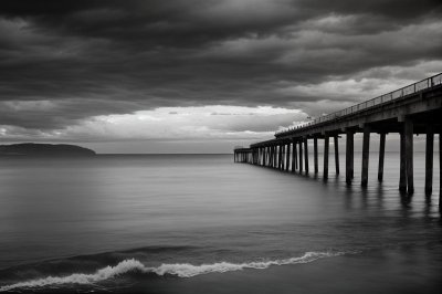 black-and-white, coastline, pier, calm, clouds, water, reflection, sunset, rain, natural, still, interface, beauty, storm, dramatic, nature, railing, window, west, composition, silence, poetic