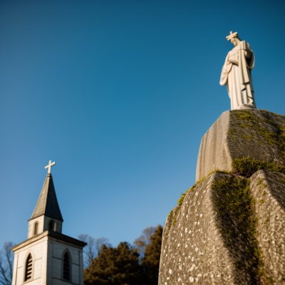 statue, church, pilgrimage site, morning, cross, rock formation, blue sky, mary, warm light, religion, corsica, holy mary, sunset, tower, calvi, religious, sculpture, catholicism, silence, center of faith