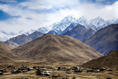 pakistan, gilgit-baltistan, mountains, karakoram, snow, village, nature, landscape, sky, clouds, cloudscape, rocks, clean air, tranquility, distance, pastures, remote, province, natural beauty