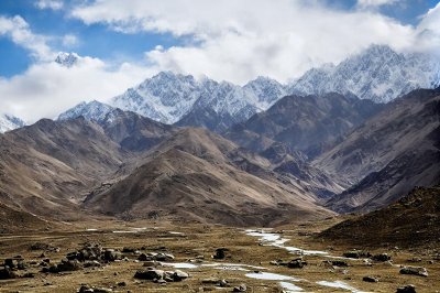 pakistan, gilgit-baltistan, karakoram, mountains, snow, natural, sky, clouds, village, spring, trees, purple, landscape, houses, agriculture, purple trees, rock formation, village landscape, agricultural terraces, spring blossoms, settlement