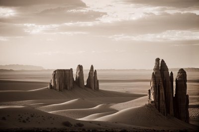 desert, rock formations, nature, sand, natural scenery, desert landscape, dryness, sunset scene, warm colors, vastness, silence, evening light, natural beauty, adventure, hiking, outdoor, tourism, emptiness, calmness, natural monument, four seasons