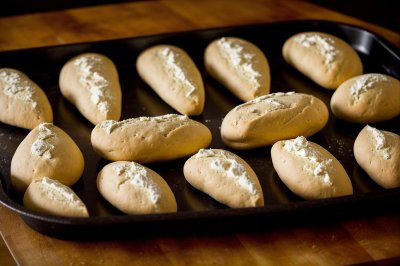 baking, dough, flatbreads, baking tray, bread making, kitchen, homemade, snacks, fermented, soft, unbaked, ingredients, wheat flour, kneading, breakfast, aroma, shaping, freshly baked, favorite, knotting