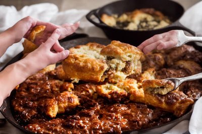 pastry, tartar, cooking, cast iron, skillet, hands, steam, watery bubble, drink, copper mug, fabric placemat, traditional design, wooden board, turkish cuisine, using uv, ethnic food, rustic, cheese, tradition, ritual, snack