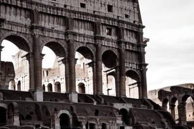 colosseum, rome, italy, amphitheater, ancient architecture, stone, arch, historic landmark, roman empire, sunny day, clear sky, wonder of the world, heritage, tourist destination, architectural details, exterior architecture, roman arches, landmark photography, evergreen