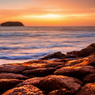 rocky beach, sunset, natural landscape, sky, wave, rock formation, seashore, sandy beach, landscape view, silhouette, golden hour, reflection, calm, nature, shelter, quiet, horizon, natural beauty, atmosphere, peace