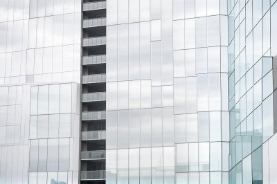 building, contemporary, glass facade, steel and glass, steel structure, narrow angle shooting, skyscraper, business district, city life, urban, corporate tower, center, architectural, minimalist, modern architecture, engineering, office complex, cityscape, symmetrical, commercial building, hospital, hospital window