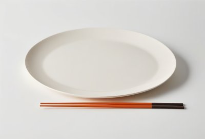 japanese new year, minimal, white plate, chopsticks, gold chopstick rest, mizuhiki, red decoration, flat lay, top view, clean, modern, celebration, copy space, zen, neutral, high resolution, food background, postcard, design template, table setting